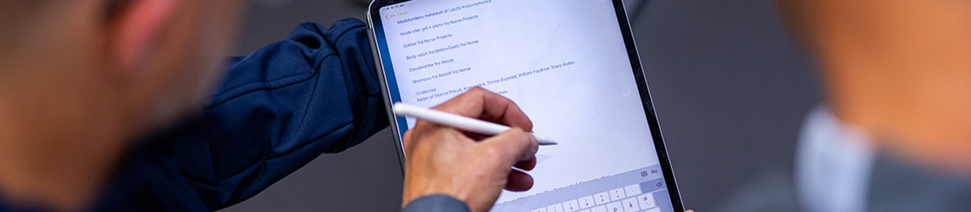 two man configuring settings